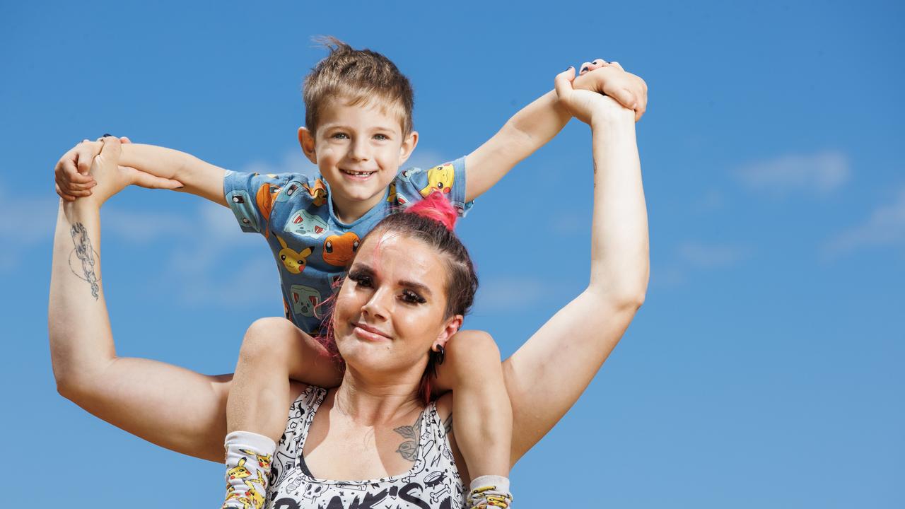 Angel Craine with her son Malachi, who is concerned no one will come to his party because they are vegan. Picture: Lachie Millard