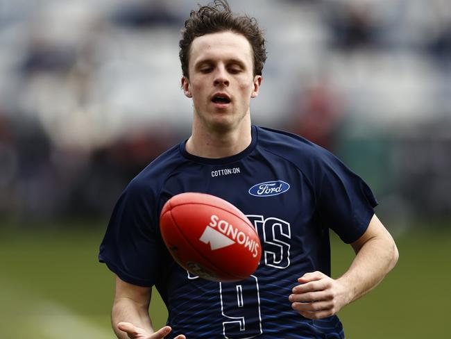 GEELONG, AUSTRALIA - JULY 09: Max Holmes of the Cats warms up before the round 17 AFL match between Geelong Cats and North Melbourne Kangaroos at GMHBA Stadium, on July 09, 2023, in Geelong, Australia. (Photo by Darrian Traynor/Getty Images)