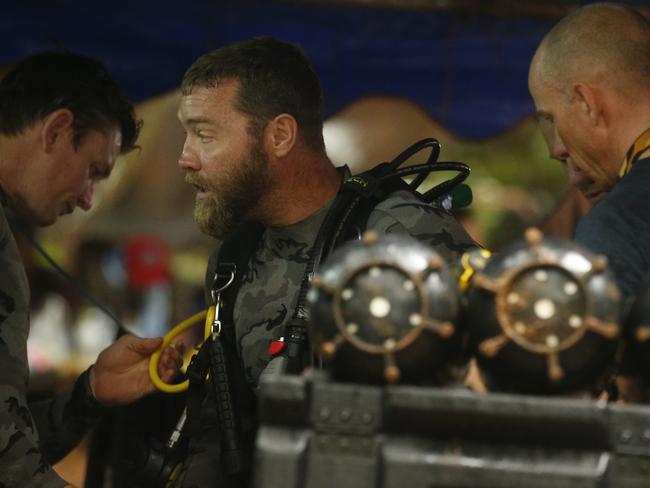 Members of the Australian Federal Police diving team are at the scene to help with the rescue. Picture: AP