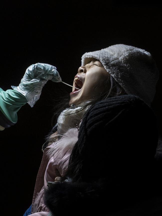 A young girl is given a Covid test. Picture: Getty Images.