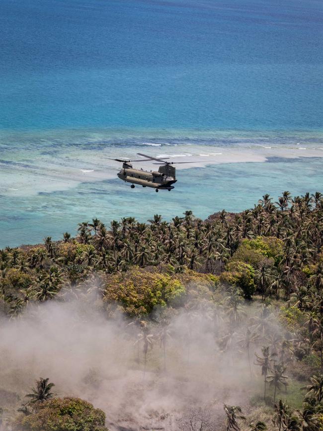 An Australian Army CH-47 Chinook helicopter heavy lift helicopter conducts a reconnaissance flight over Atata Island, Tonga, during Operation Tonga Assist 2022. Picture: LSIS David Cox