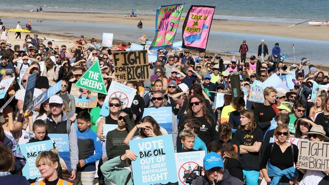 Crowds gathered at Brighton Beach to protest against Equinor’s drilling plans. Picture: AAP/Emma Brasier