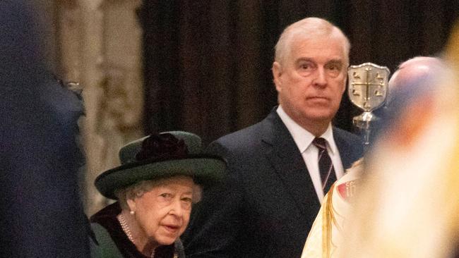 Queen Elizabeth and Prince Andrew, arrive at the service of thanksgiving. Picture: AFP.