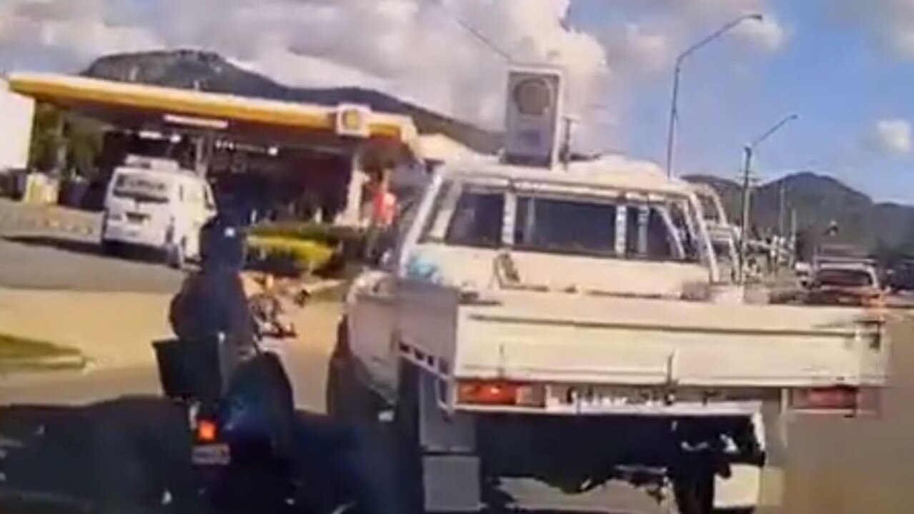 Dashcam footage has captured a scooter rider’s brush with death on a busy Townsville road.