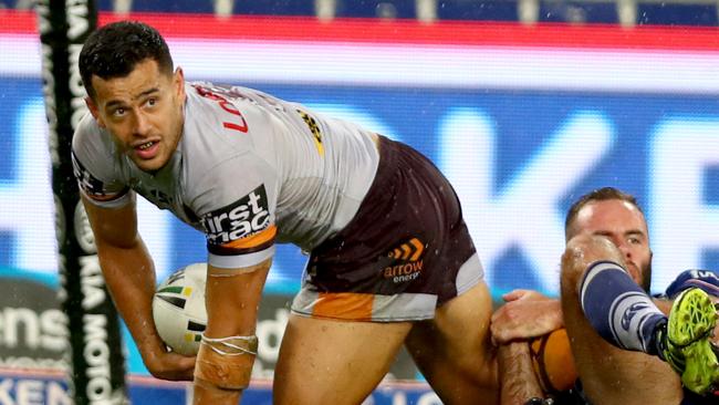 Bronco's Jordan Kahu after he picked up the short drop kick and attempted to score a try during the round 5 NRL game between the Canterbury Bulldogs and the Brisbane Broncos at ANZ Stadium , Homebush . Picture : Gregg Porteous