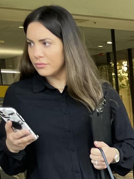 Melissa Criniti leaves Parramatta Local Court after pleading guilty to driving while her licence was cancelled.