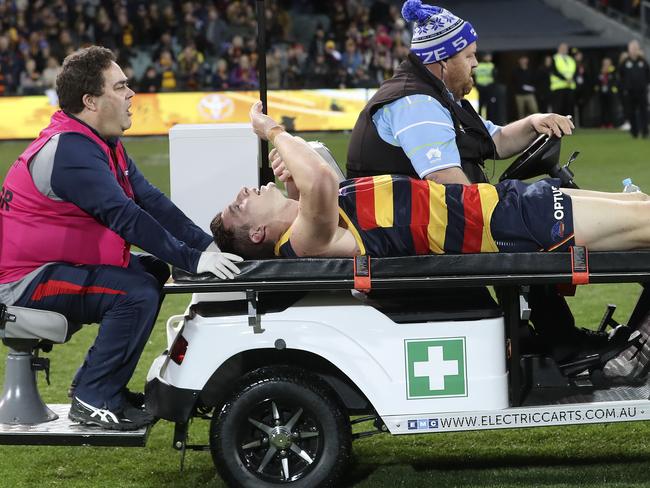 AFL - Round 13 - Adelaide Crows v Richmond at the Adelaide Oval. Josh Jenkins taken from the oval with a knee injury Picture SARAH REED