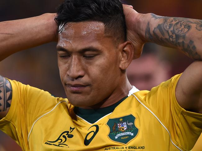 Wallabies player Israel Folau reacts following the First Test between the Australia Wallabies and the England Roses at Suncorp Stadium in Brisbane, Saturday, June 11, 2016. (AAP Image/Dave Hunt) NO ARCHIVING, EDITORIAL USE ONLY