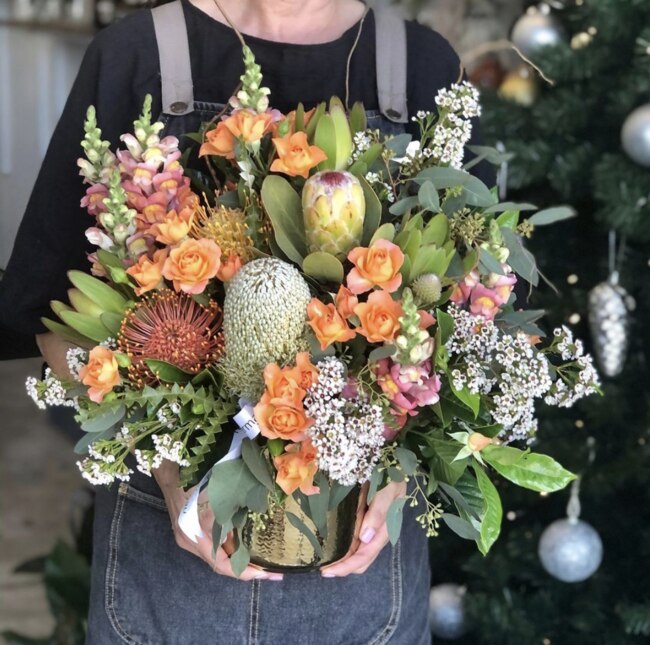 Metallic pot arrangements in stunning rustic tones are available in-store and online. Picture: Instagram @northsideflowermarket