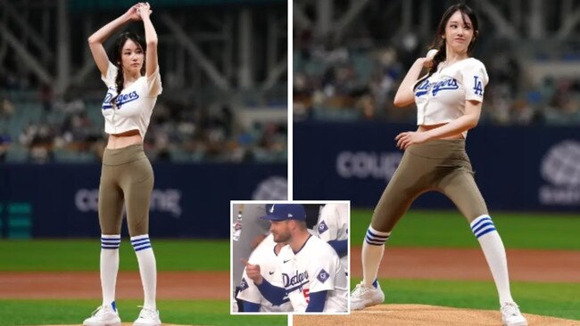 A popular South Korean actress had the full attention of the Dodgers dugout as she threw out the first pitch. Picture: Getty