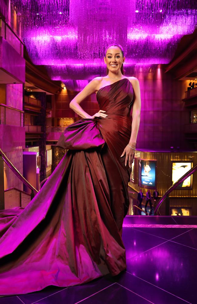 Brodie Ryan partner of Nathan Buckley wears a flowing dress at Crown Towers. Picture: David Caird
