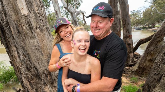 Tilly Wilkes, 12, suffers from a rare skin condition. She is pictured here with parents Kelly and Corey. Picture: Rob Leeson