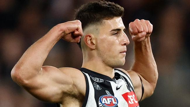 MELBOURNE, AUSTRALIA - JULY 07: Nick Daicos of the Magpies celebrates a goal during the 2023 AFL Round 17 match between the Western Bulldogs and the Collingwood Magpies at Marvel Stadium on July 7, 2023 in Melbourne, Australia. (Photo by Michael Willson/AFL Photos via Getty Images)