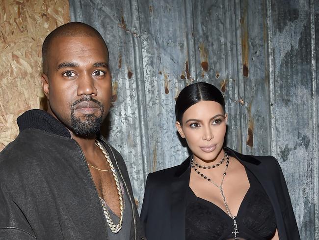 NEW YORK, NY - SEPTEMBER 11: Rapper Kanye West (L) and television personality Kim Kardashian attend the Givenchy fashion show during Spring 2016 New York Fashion Week at Pier 26 at Hudson River Park on September 11, 2015 in New York City. (Photo by Larry Busacca/Getty Images)