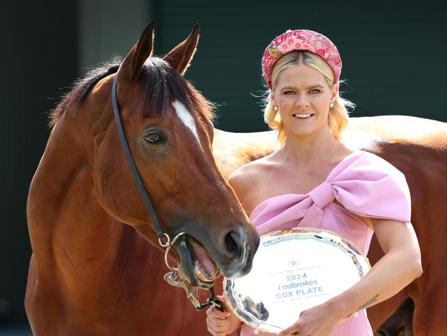 Olympic swimmer Shayna Jack cuddles up with Cox Plate fancy Docklands tasting the Cox Plate at Werribee Racecourse Quarantine Centre.                      Picture: David Caird