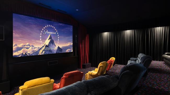 The main residence houses an 18-seat cinema. Image supplied by Ray White New Farm.