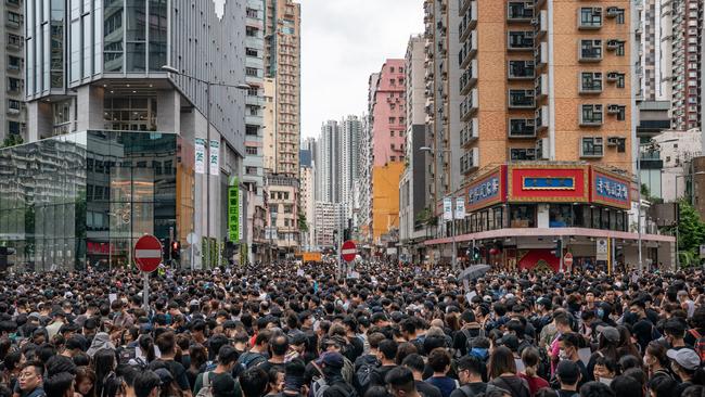 HONG KONG, CHINA - AUGUST 3: Protesters take part in a march during a demonstration on August 3, 2019 in Hong Kong, China. Pro-democracy protesters have continued rallies on the streets of Hong Kong against a controversial extradition bill since 9 June as the city plunged into crisis after waves of demonstrations and several violent clashes. Hong Kong's Chief Executive Carrie Lam apologized for introducing the bill and declared it "dead", however protesters have continued to draw large crowds with demands for Lam's resignation and completely withdraw the bill. (Photo by Anthony Kwan/Getty Images) *** BESTPIX ***