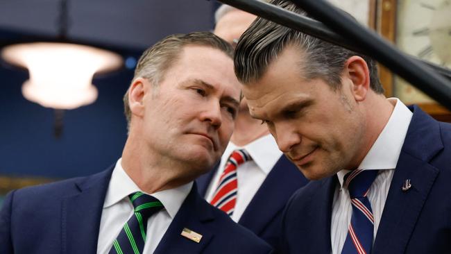 US National Security Adviser Mike Waltz (left) speaks with Defence Secretary Pete Hegseth. (Photo by Ludovic MARIN / AFP)