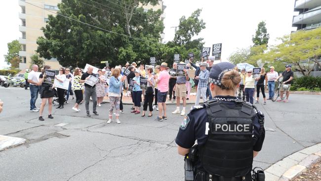 Police watch on as locals protest at Kangaroo Point. Picture: Peter Wallis