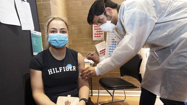 Anna receives a Covid vaccination at Broadmeadows Town Hall. Picture: David Geraghty