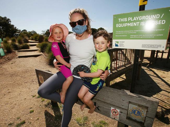 Belinda White with her children Hannah and Austin Clark at Torquay on Sunday. Picture: Alan Barber