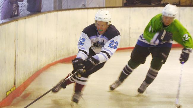 The grand final of the Gold Coast Ice Hockey League was held at Iceland, Bundall. Pictured here was David Upton and Craig Montgomery.