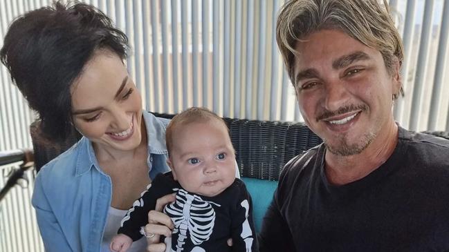 John Ibrahim and partner Sarah Budge with their baby son Elvis.