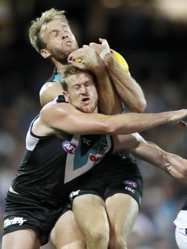 Jack Hombsch and Tom Jonas clash as both go for the ball against Geelong in Round 5. Picture: Sarah Reed