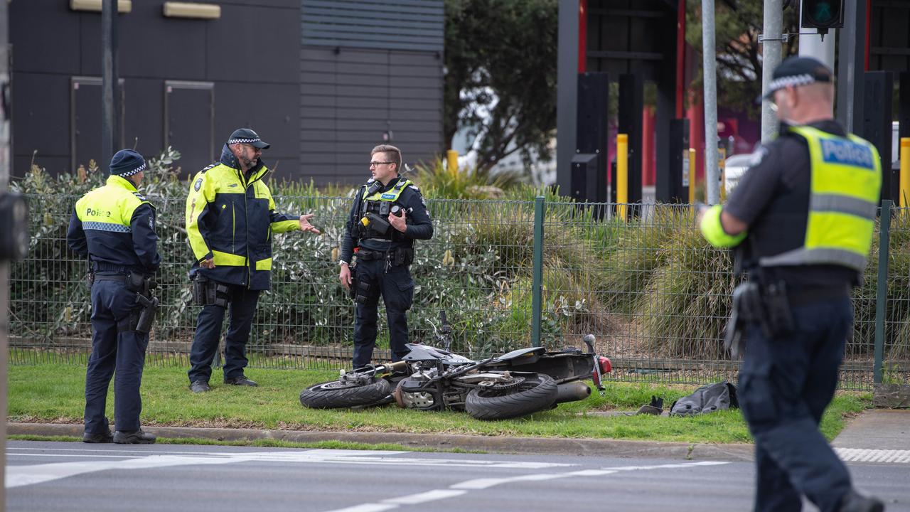 Police at the scene at the intersection of Melaluka Road and Bellarine Highway, Leopold. Picture: Brad Fleet