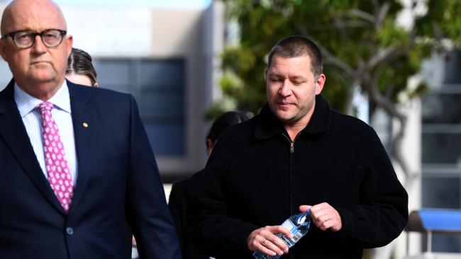 Thunder River Rapids ride operator Peter Nemeth (right) and his lawyer Ralph Devlin QC (AAP Image/Dan Peled)