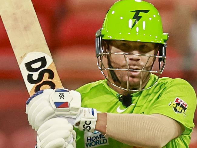 SYDNEY, AUSTRALIA - JANUARY 27: David Warner of the Thunder bats during the Men's Big Bash League match between the Sydney Thunder and the Brisbane Heat at Sydney Showground Stadium, on January 27, 2023, in Sydney, Australia. (Photo by Mark Evans - CA/Cricket Australia via Getty Images)