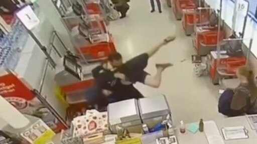 The scuffle quickly escalated, with the security guard body slamming the customer to the floor. Picture: 7 NEWS