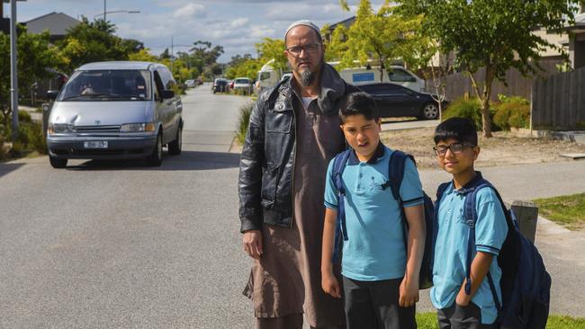 Ashrad Khan says the lack of footpaths has made him fear for the safety of his children.