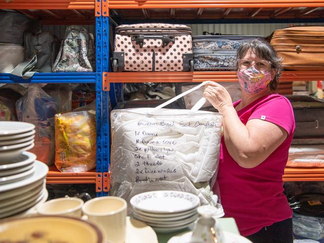 Mend and Make Do Crew coordinator Ursula Tunks readies another kit go out to the community.