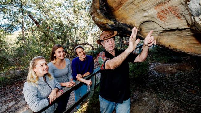 Laurie Bimson who claims to be a descendant of Aboriginal leader King Bungaree giving a tour.