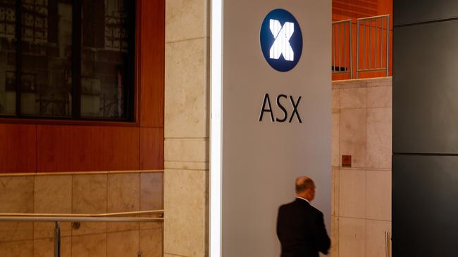 SYDNEY, AUSTRALIA - NewsWire Photos, October 29 2024. GENERIC. Stocks. Finance. Economy. A security guard in the lobby of the ASX Australian Stock Exchange on Bridge Street. Picture: NewsWire / Max Mason-Hubers