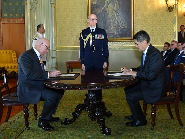 New Minister for Skills and Tertiary Education Geoff Lee is sworn in by NSW Governor David Hurley on Tuesday. Picture: Joel Carrett