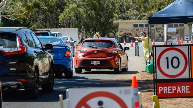 Drivers queue for RATs at Josie Agius Park on Greenhill Road. Picture: Brenton Edwards.