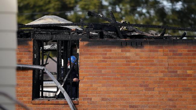 Investigators examine the site. Picture: Darren Pateman