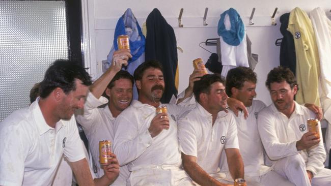 The Australian cricket team celebrate their win against England in the First Test in the Ashes series at Headingley, 13th June 1989. Tasmanian batsman David Boon is seated third from left. (Photo by Adrian Murrell/Getty Images)