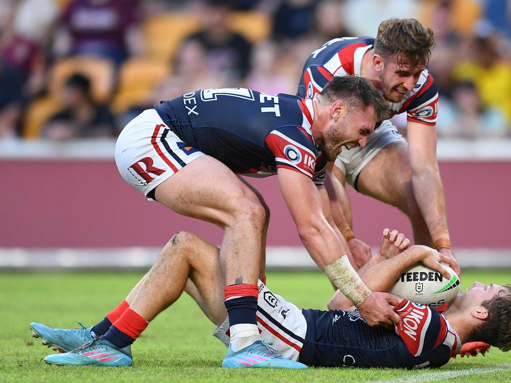 Sam Walker is congratulated by his Roosters teammates after scoring a try. Picture: Albert Perez/Getty Images