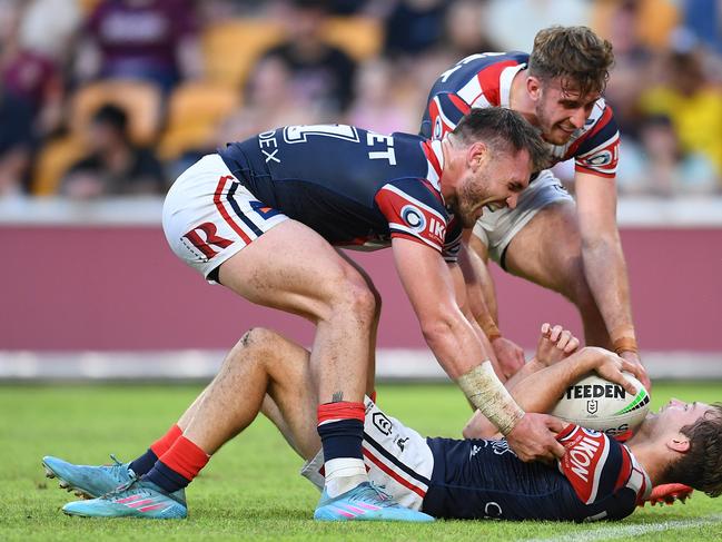 Sam Walker is congratulated by his Roosters teammates after scoring a try. Picture: Albert Perez/Getty Images