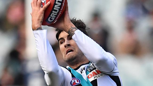 Port Adelaide’s Chad Wingard marks against Carlton at the MCG.