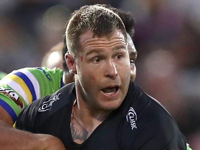 PENRITH, AUSTRALIA - AUGUST 05: Trent Merrin of the Panthers is tackled during the round 21 NRL match between the Penrith Panthers and the Canberra Raiders at Panthers Stadium on August 5, 2018 in Penrith, Australia.  (Photo by Ryan Pierse/Getty Images)