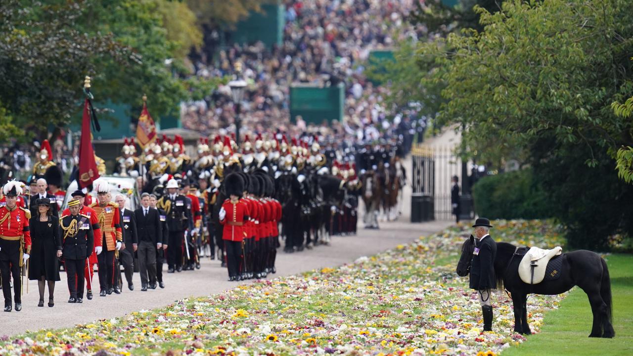 Emma, the monarch’s fell pony, stands as the Ceremonial Procession of the coffin of Queen Elizabeth II arrives at Windsor Castle. Picture: Andrew Matthews – WPA Pool/Getty Images