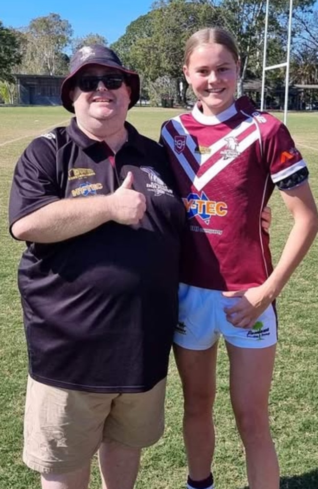 Takoda Thompson and former Kawana Dolphins women's head coach Geoff Wheeler.