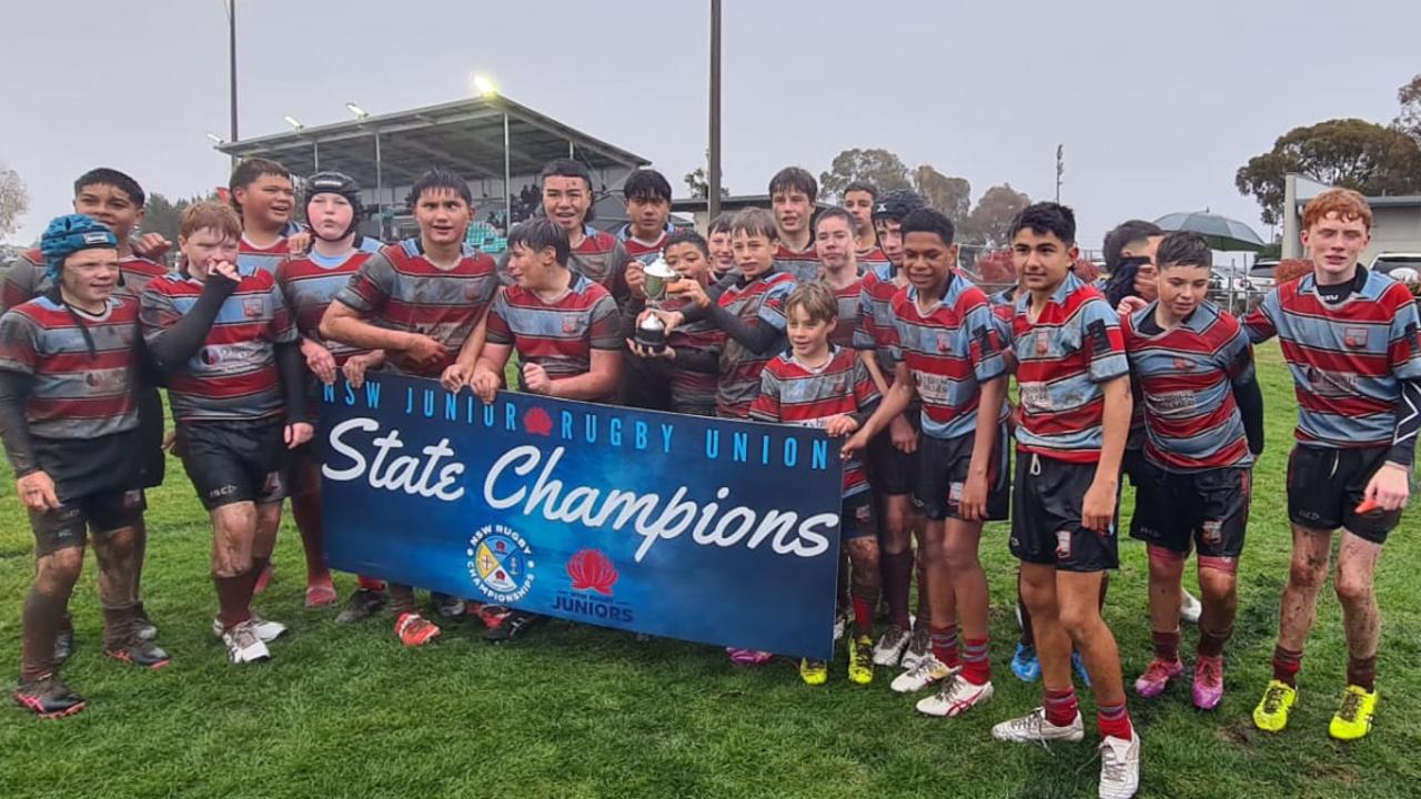 Snow good! NSW junior rugby winners, grinners in snow, sun, rain