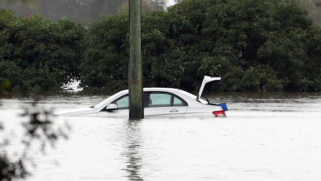 Oxley Road was closed due to flooding. Picture: Zak Simmonds