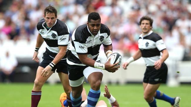 Taqele Naiyaravoro of the Barbarians charges upfield against Samoa at the Olympic Stadium.