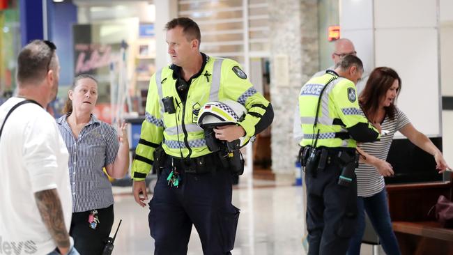 Police interview witnesses following a violent fight at Australia Fair. Picture: Nigel Hallett